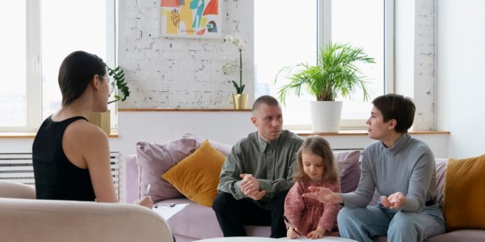 3c55d16-bf27-52a-f4f-5fd528f0f4d_parents_and_kid_doing_therapy